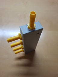 Blocco distributore d'acqua bianco-giallo a 4 vie – per tubi dell'acqua da 10 mm
