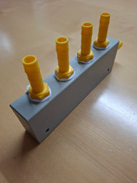 Blocco distributore d'acqua bianco-giallo a 4 vie – per tubi dell'acqua da 10 mm