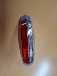 Luce di ingombro Hella ovale sinistra – 12 V con base grigia