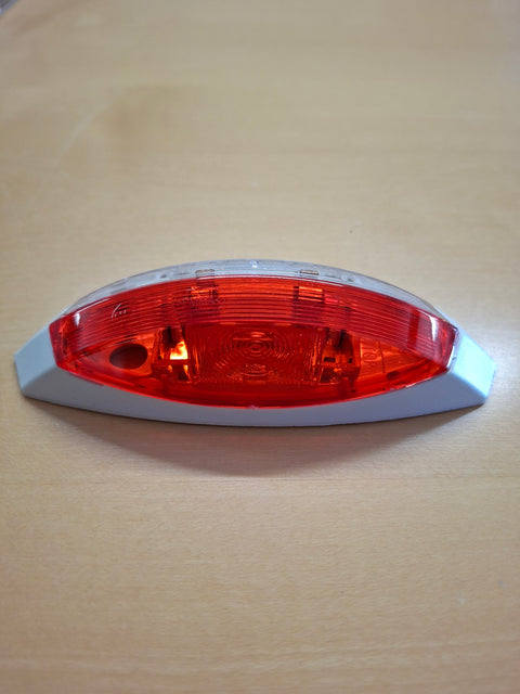 Umrissleuchte rot/weiss links mit weisser Grundplatte – 122,2 x 39,2 x 28,6 mm