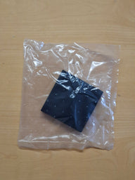 Cornice per presa Berker INTEGRO a 1 posto con coperchio a ribalta – nero granito