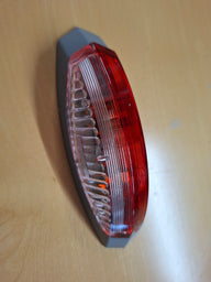 Luce di ingombro Hella ovale sinistra – 12 V con base grigia